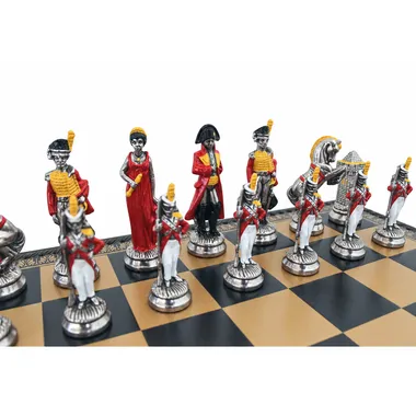 Hand-painted Napoleon chess pieces lined up on the chess board