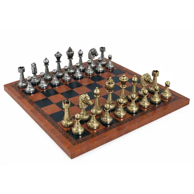 Staunton metal chess set on brown faux leather chess board, full view