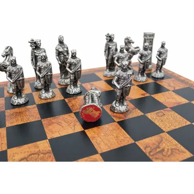 Silver-toned Roman and barbarian pieces arranged on the world map chessboard