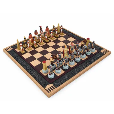 Resin chess set Roman vs Egyptian on an ornate chess board
