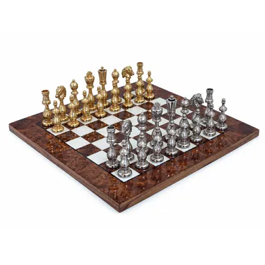 Complete chess set, gold and silver pieces on lacquered elm burl chessboard