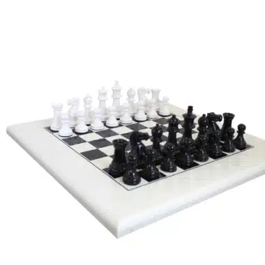 Black and White Staunton Chess Pieces and White Chess Board