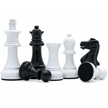 Close-up of black and white Staunton pieces with felt base