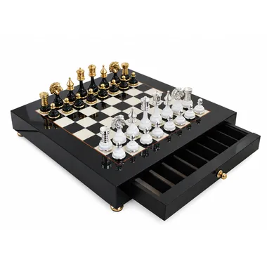 Pedestal chess board with open drawer revealing piece storage