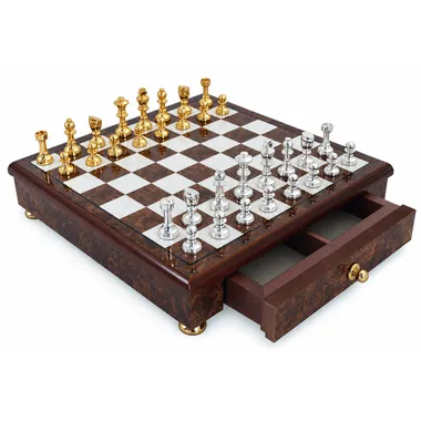 Complete gold and silver-plated Staunton chess set on wooden board with open drawer