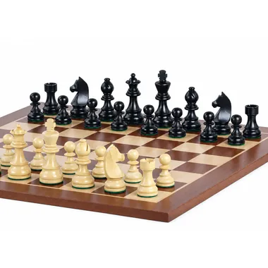 Staunton pieces in ebony and boxwood arranged on the mahogany chess board, close view