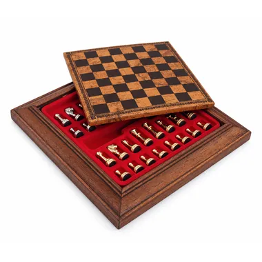 Wooden box opened revealing magnetic pieces stored in red felt