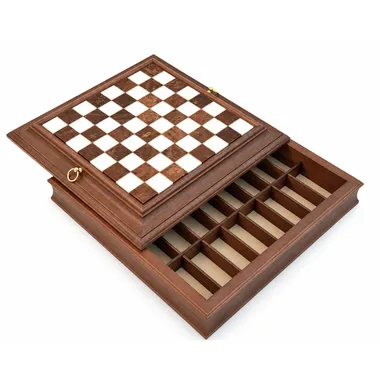 Wooden chess board open showing the compartmented storage drawer