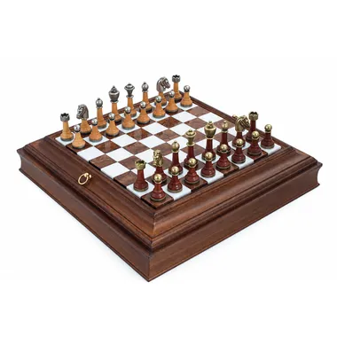 Complete chess set with metal and wood pieces on marble board and wooden box