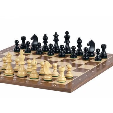 Boxwood chess pieces in black and natural facing each other on the board