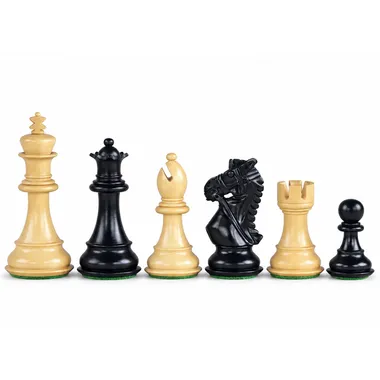 Chess pieces in boxwood and ebonised boxwood, black queen, bishop, knight and rook