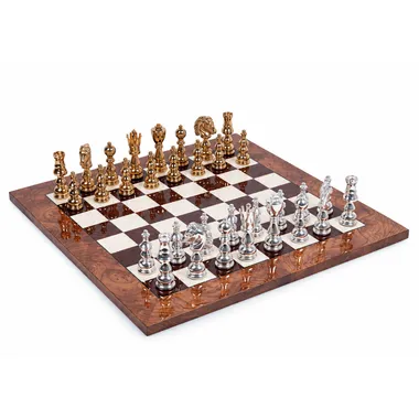 Complete chess set with gold and silver pieces on a lacquered elm wood board