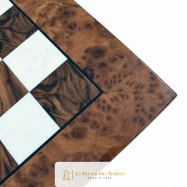 Corner of the elm and briarwood chess board with a glossy finish
