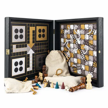 Open multi-game box with chessboard, ludo, snakes and ladders and pieces