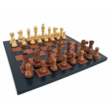 Complete acacia wood chess set arranged on the genuine leather chess board