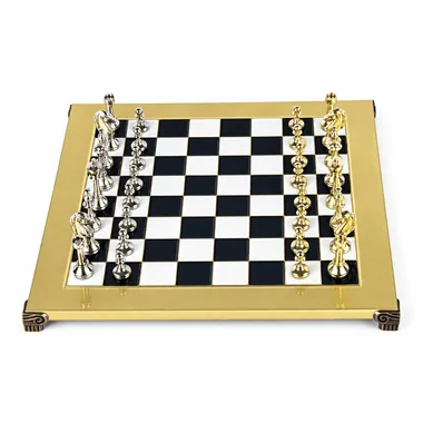 Golden chessboard with silver and gold Staunton metal pieces