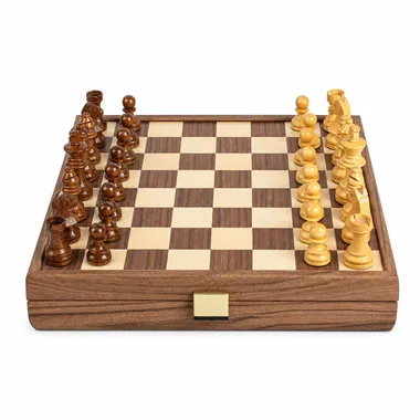 Complete chess set in walnut and oak with pieces set up and closed storage box
