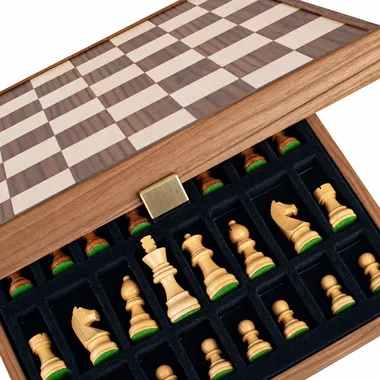 Open storage box showing Staunton pieces nestled in their dedicated compartments