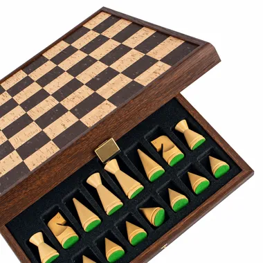 Open storage box showing light wood pieces stored in their compartment