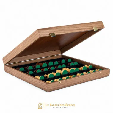 Open walnut storage box with chess pieces resting on green felt