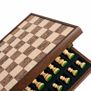 Open chessboard showing the built-in piece storage in foam padding