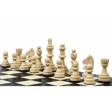 Light wooden chess pieces, close-up view on the black and white board