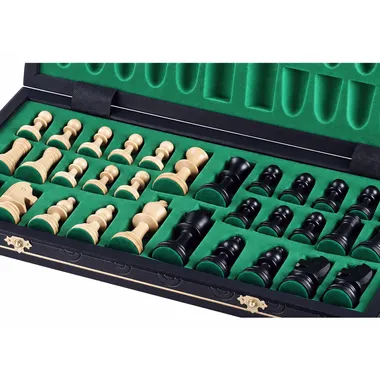 Open storage box with black and white Staunton pieces on green felt