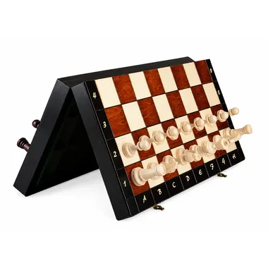 Magnetic chess board folded in half showing hinges and white pieces