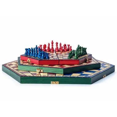 Chess set for 3 players with Staunton pieces set up on the board