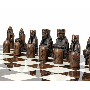 Isle of Lewis reproduction pieces lined up, detail of the brown carvings