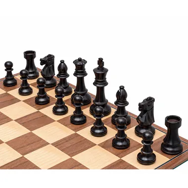 Black Staunton Conquest pieces lined up on the walnut and maple chess board