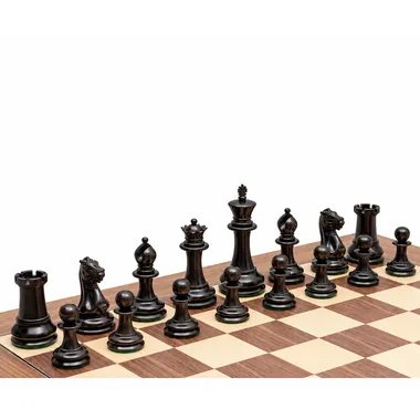 Black chess pieces of the Staunton 1851 set lined up on the board
