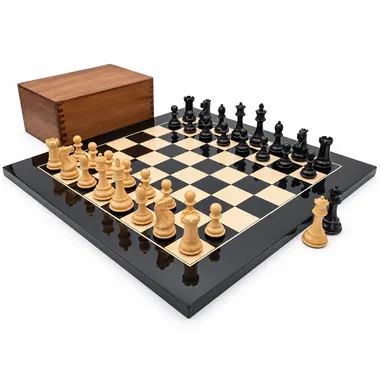 Luxury Staunton competition chess set, pieces arranged with storage box