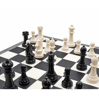 Close-up of black and white pieces arranged mid-game on the board