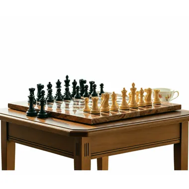 Highgrove Luxe chess set lit by natural light - Le Palais des Échecs