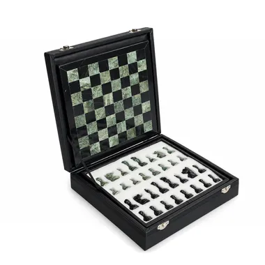 Open storage box showing the marble chessboard and stored pieces