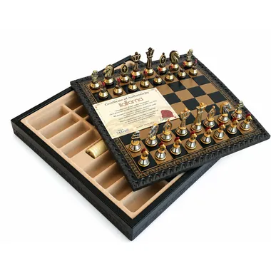Open chess box showing the black faux-leather board and the interior storage compartment for the Roman pieces