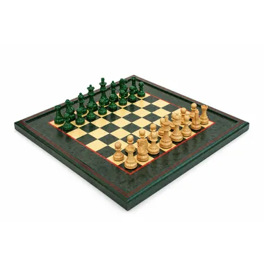 Complete chess set in green and ivory lacquered boxwood on a glossy briar burl chess board