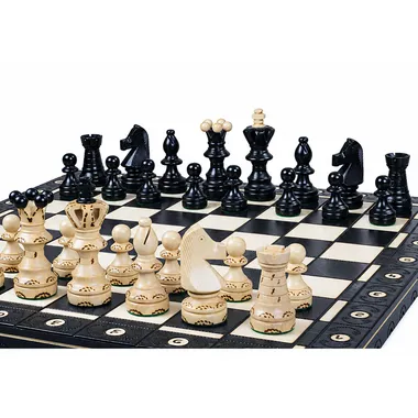 Chess set on a wooden board with black and white pieces - Le Palais Des Echecs